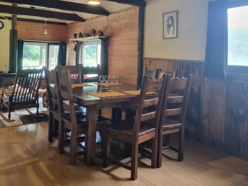 Dining room with solid wood table and eight chairs