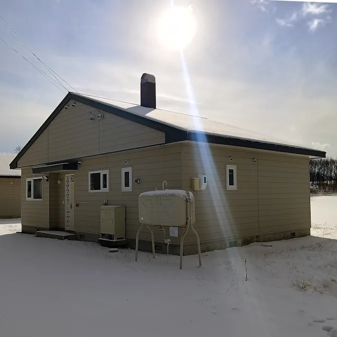 Bears Cottage 1 exterior under snow in winter